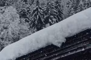 Read more about the article Winter Roof Care: Preventing Ice Dams and Snow Damage